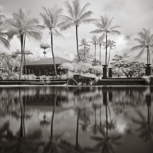 Black and white infrared of the pool and palm trees at the Hana Hotel in Maui Hawaii