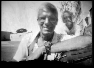 Black and white pinhole photo of Chris Keeney and an anonymous student photographed by a fourth grader at the Loma Portal Elementary School In San Diego