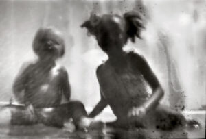 ANSCO 620 Flash homemade black and white pinhole photograph of two children playing on the beach at La Jolla Shore San Diego California