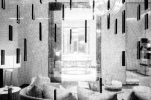 Black and white street photo looking into a store window in San Francisco of vertical black lines in the foreground with white star like spots and living room decor in the background.