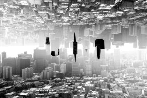 Black and white double exposure photograph of the city skyline of San Francisco California. The top of the image is upside down and the bottom is right side up.